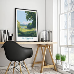 Greenwich London travel poster with scenic park in black frame on modern office desk