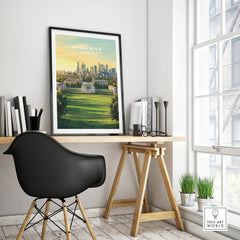 Greenwich London travel poster with city skyline in black frame on modern office desk