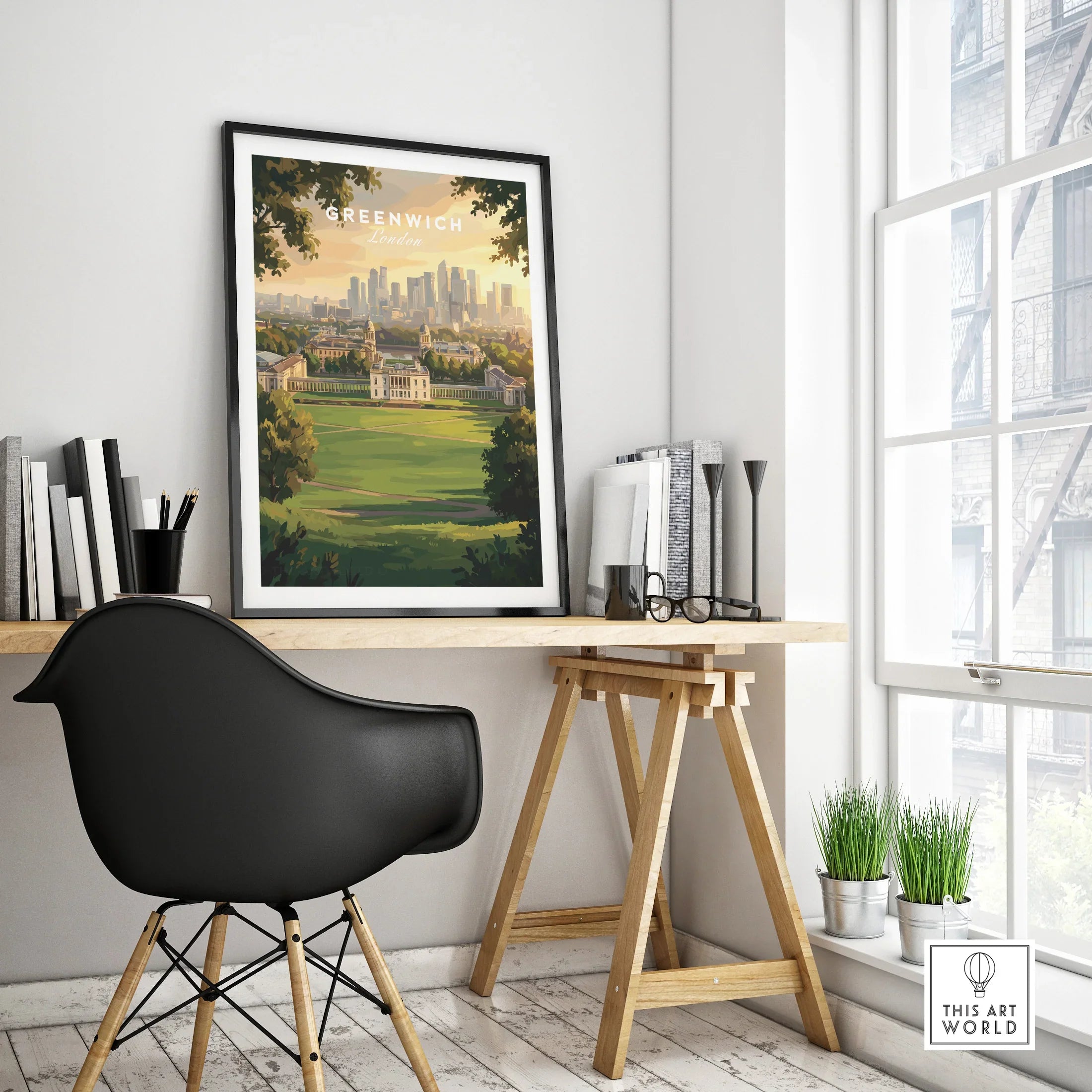 Greenwich London travel poster print with black frame on modern home office desk by window