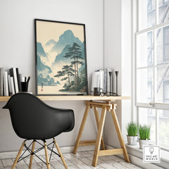 Japanese woodblock style mountain landscape framed poster on modern office desk
