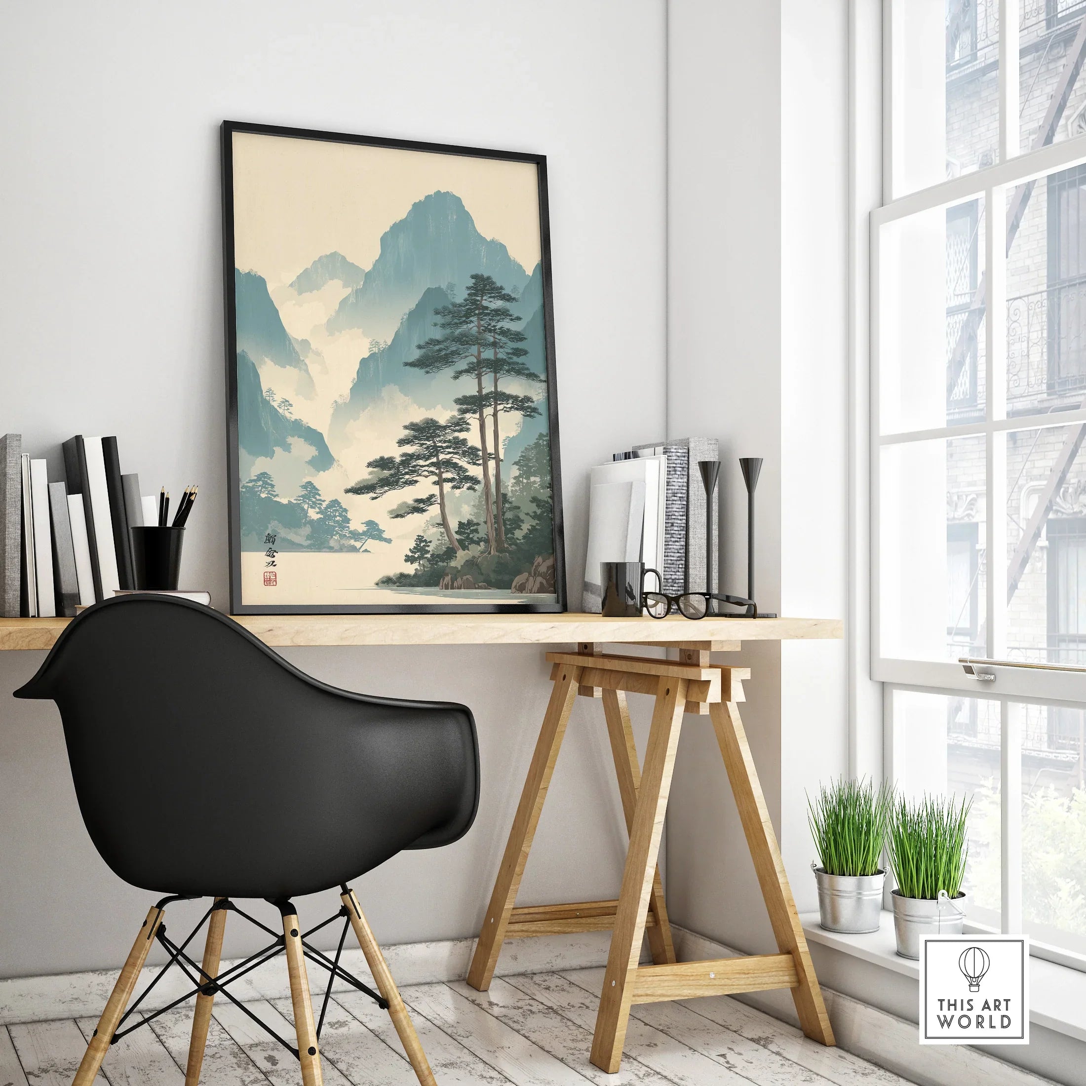 Japanese woodblock style mountain landscape framed poster on modern office desk