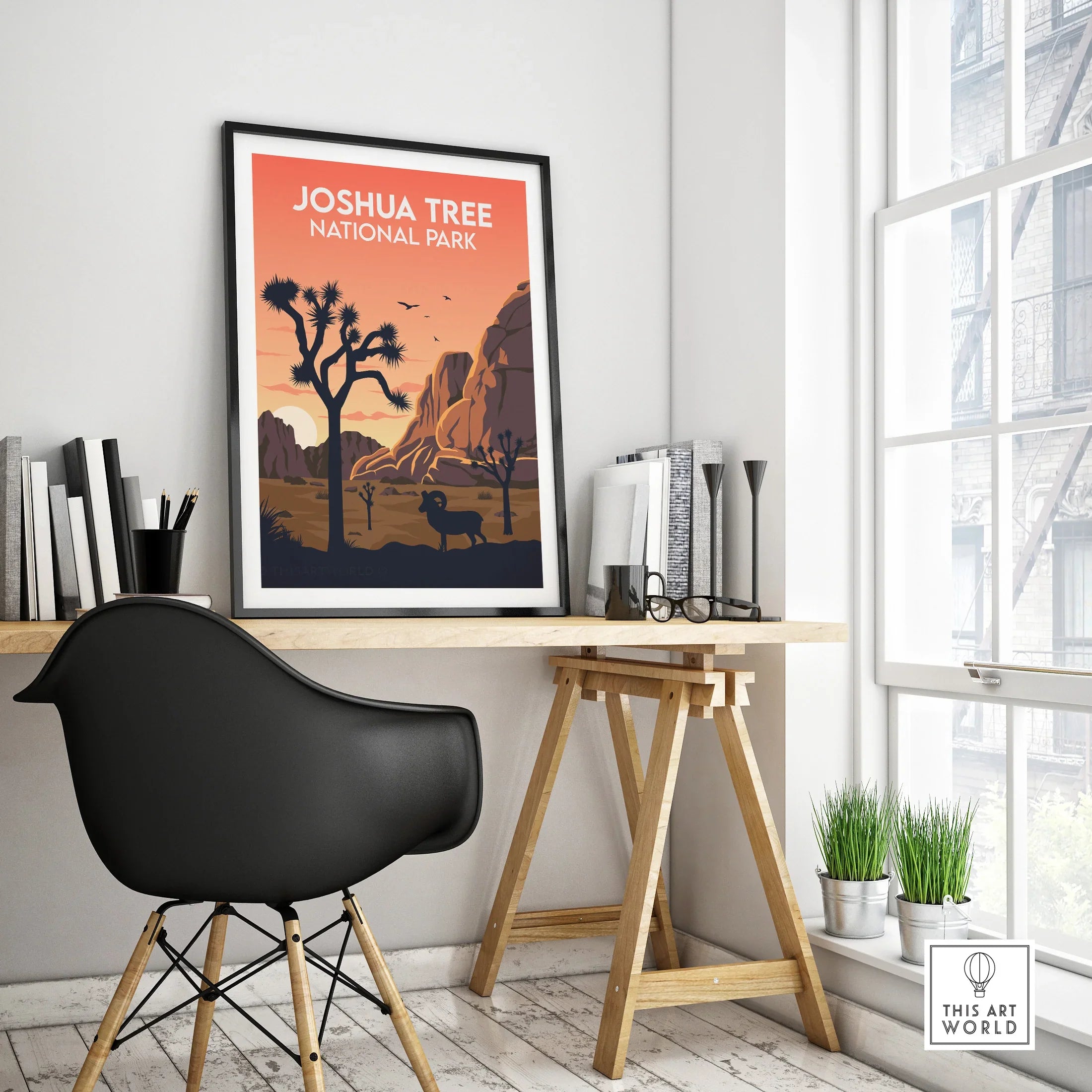 Framed Joshua Tree National Park travel poster on modern office desk with black chair