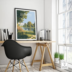 Framed Kew Gardens travel poster on modern office desk, black chair, and decor accents