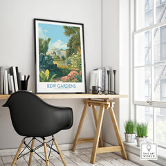 Framed Kew Gardens travel poster on modern office desk, cityscape visible through window