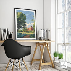 Framed Kew Palace travel poster on modern office desk with black chair and window view