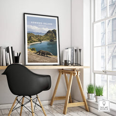 Komodo Island travel poster in black frame on modern office desk, city view, minimalist decor