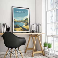 Komodo Island travel poster in black frame on modern office desk, city view window
