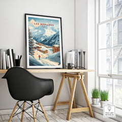 Les Menuires France travel poster in black frame on modern office desk with mountain wall art decor