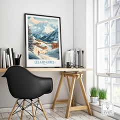 Framed Les Menuires travel poster on modern office desk, with mountain ski scene art