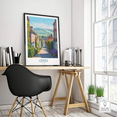 Lewes England travel poster in black frame on modern office desk, cityscape wall art