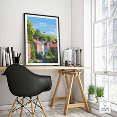 Lewes England travel poster in black frame on modern office desk, contemporary home decor