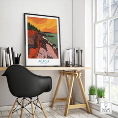 Framed Acadia National Park travel poster on modern office desk with black chair