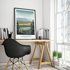 Cairngorms National Park travel poster in black frame on modern office desk by window
