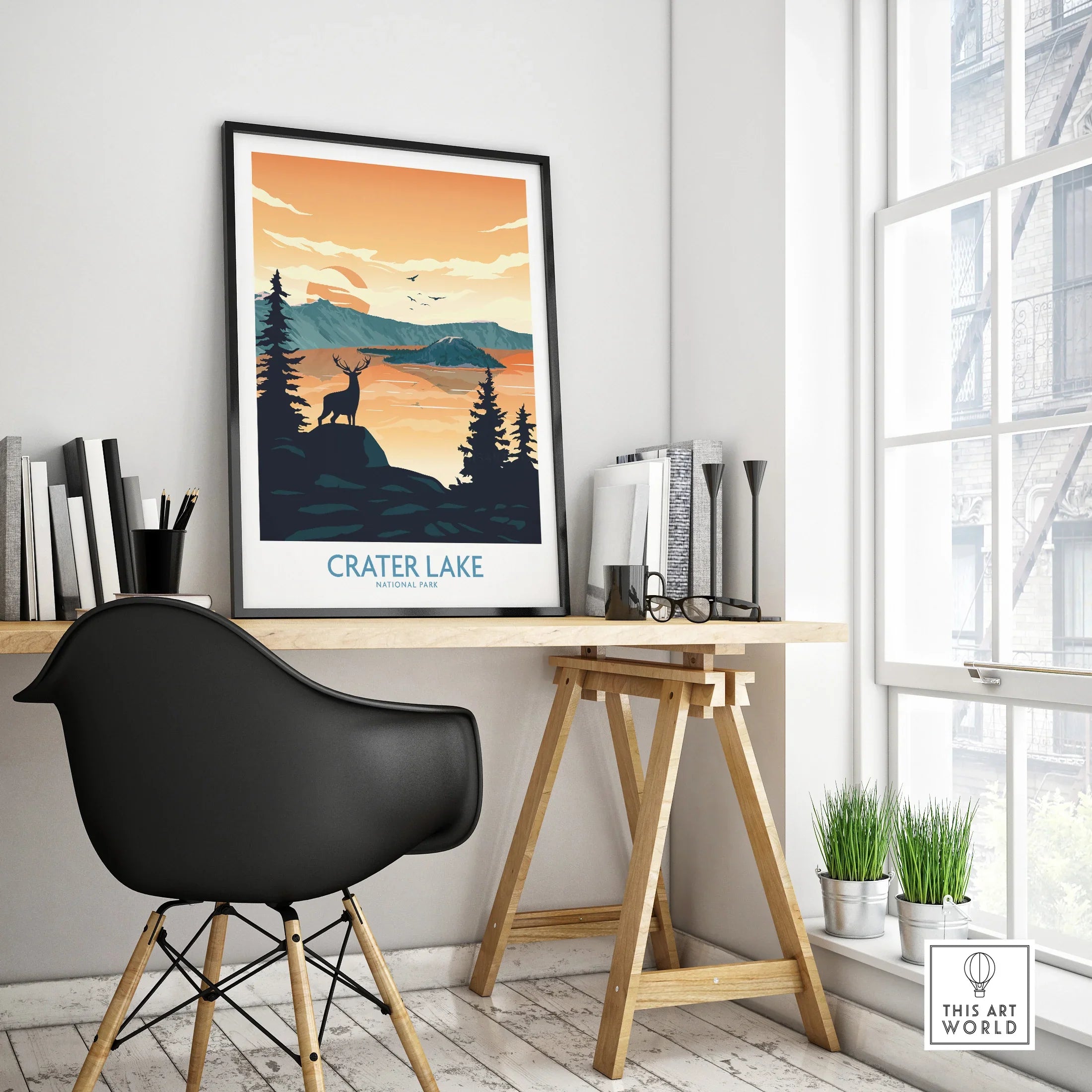Crater Lake National Park travel poster in black frame on modern office desk