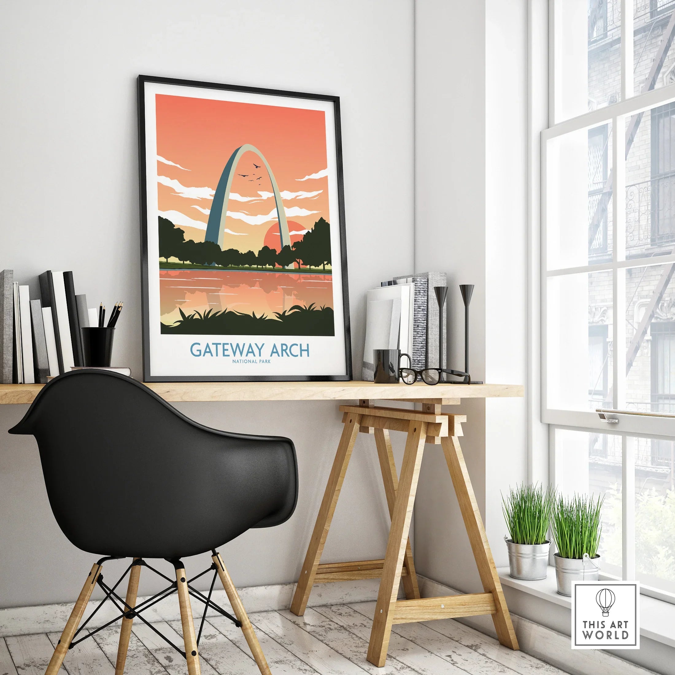 Gateway Arch National Park travel poster in black frame on modern office desk