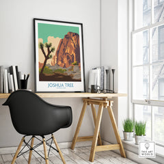 Modern office with Joshua Tree National Park travel poster in black frame on desk