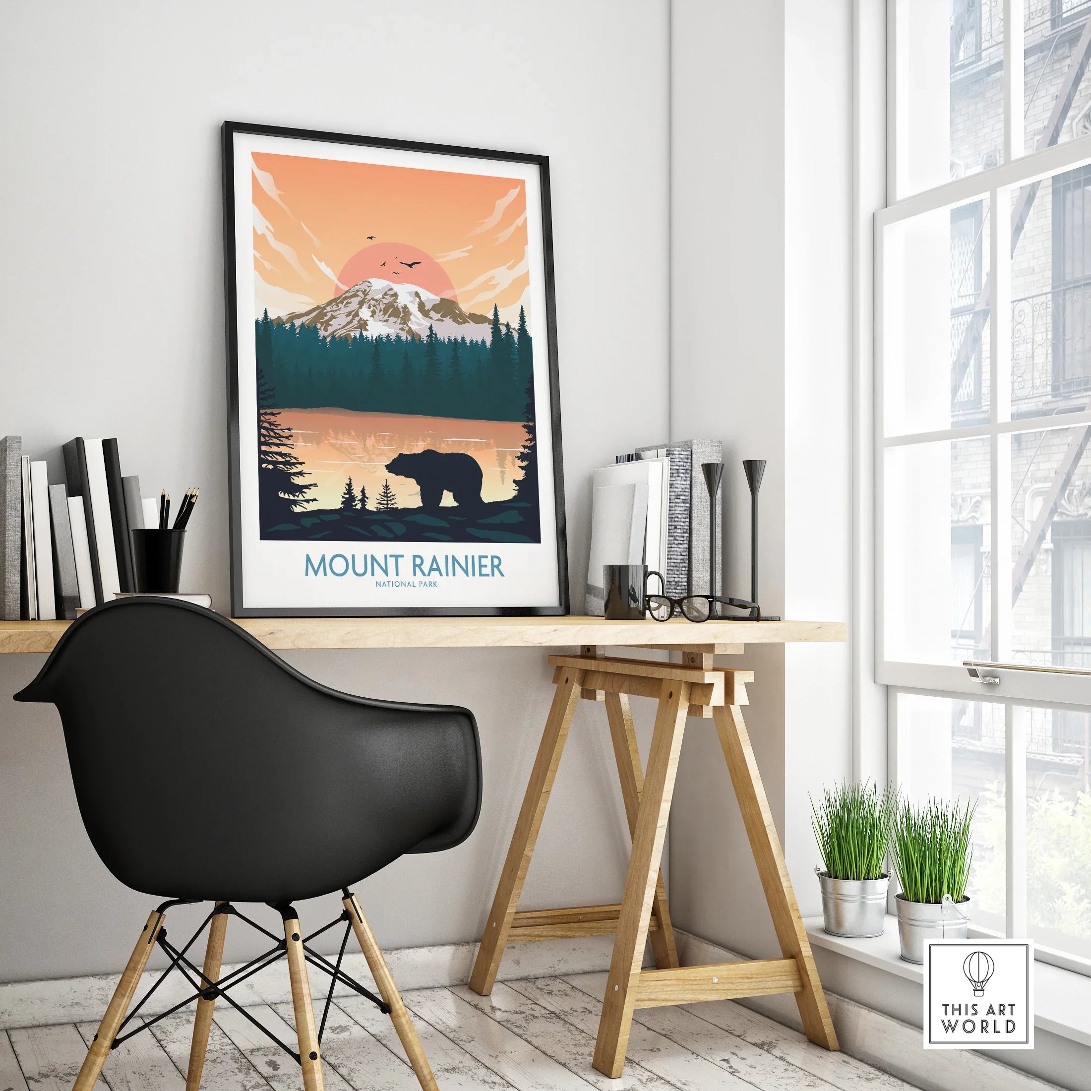 Framed Mount Rainier National Park travel poster on modern office desk, minimalist decor