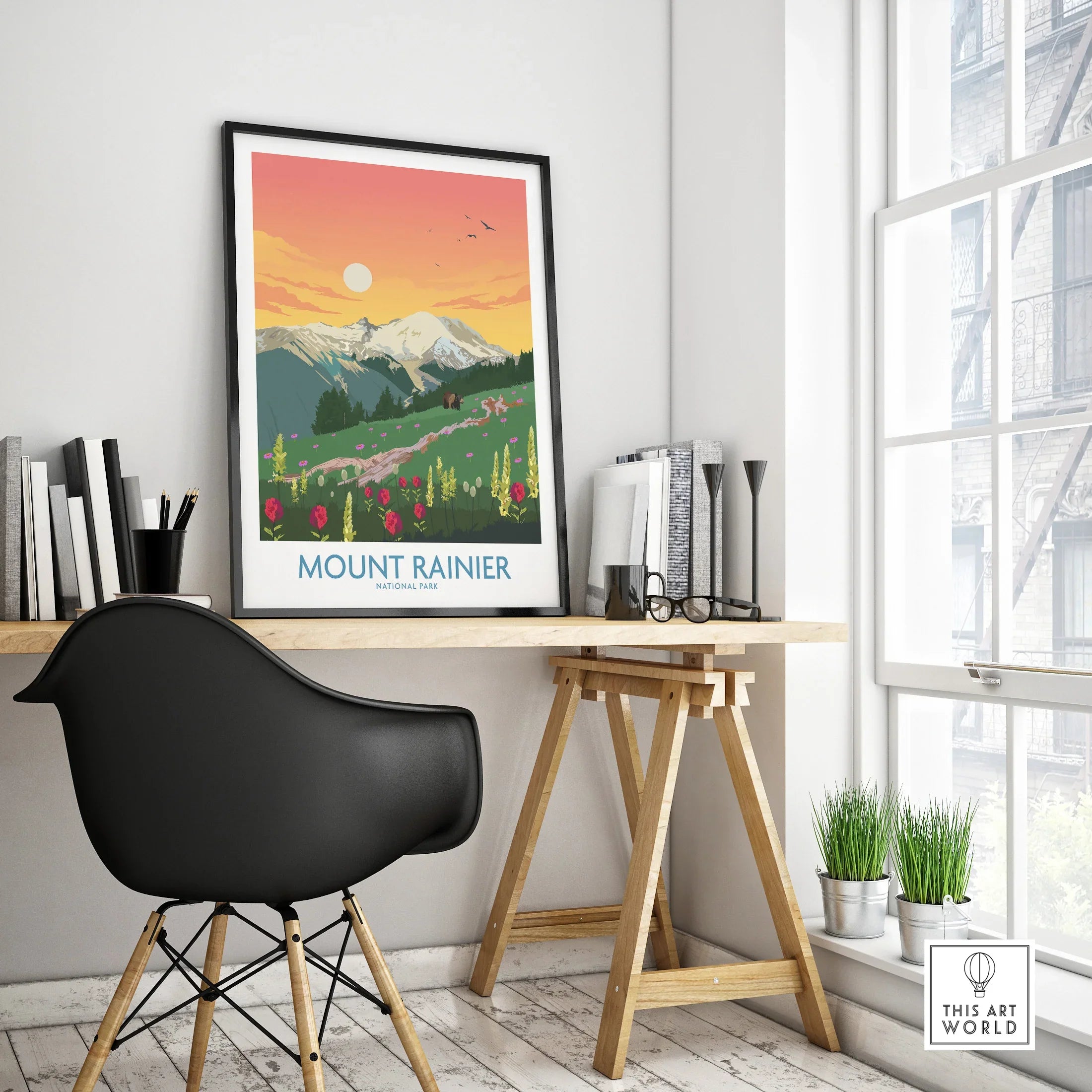 Framed Mount Rainier National Park travel poster on modern office desk with chair and decor