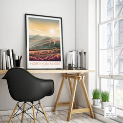 Framed North York Moors National Park travel poster on modern office desk
