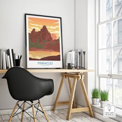 Framed Pinnacles National Park travel poster on modern office desk by window