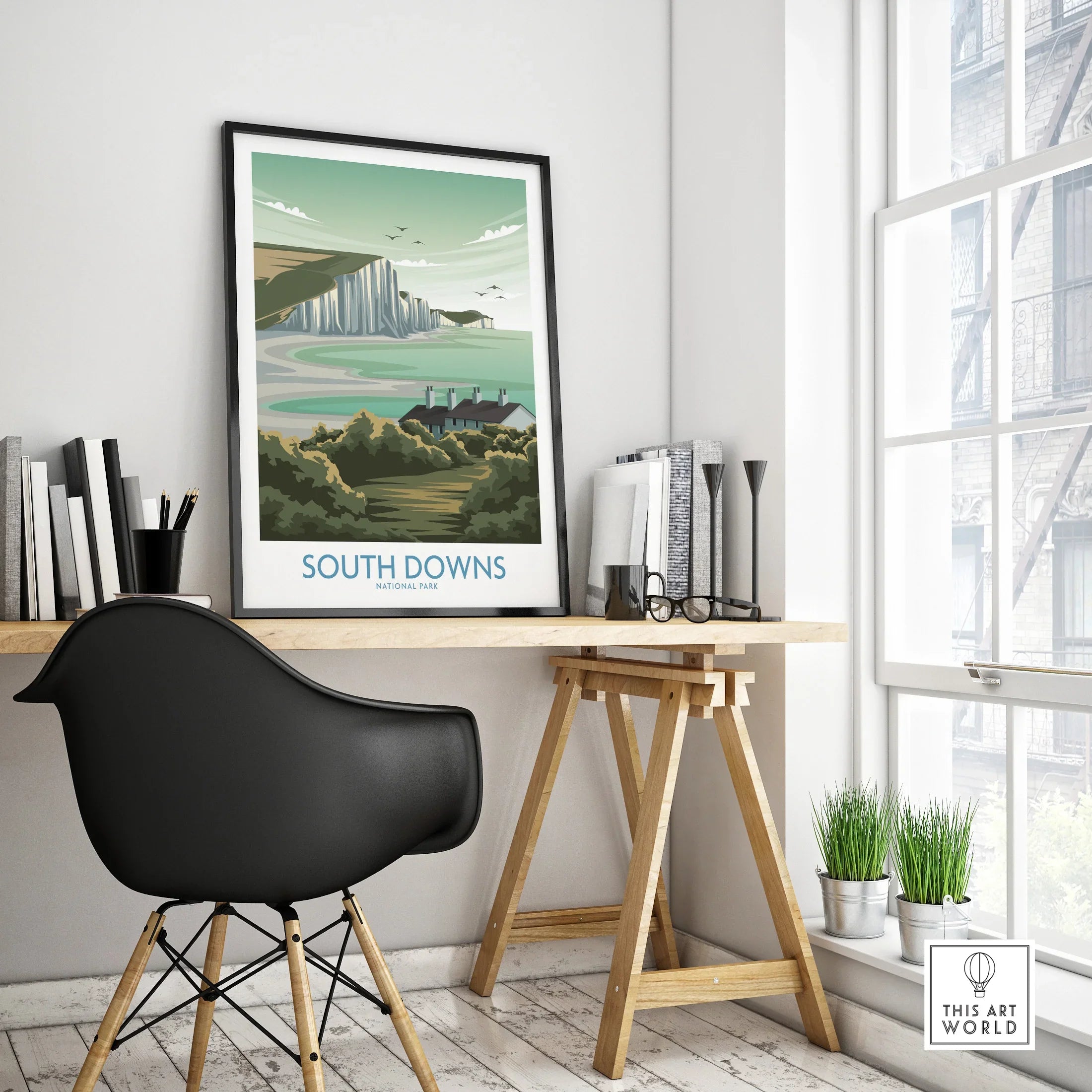 Framed South Downs National Park travel poster on modern office desk decor