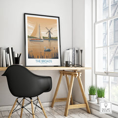 Framed The Broads National Park travel poster on modern office desk with black chair