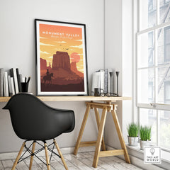 Monument Valley framed travel poster on modern office desk, wall art decor