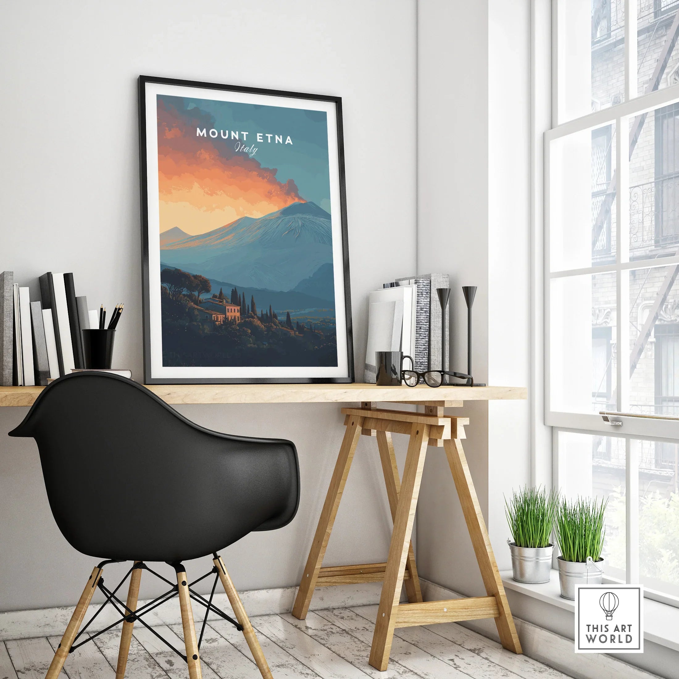 Framed Mount Etna Italy travel poster on modern office desk, contemporary home decor