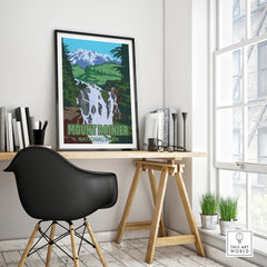 Framed Mount Rainier National Park travel poster on modern office desk, minimalist decor