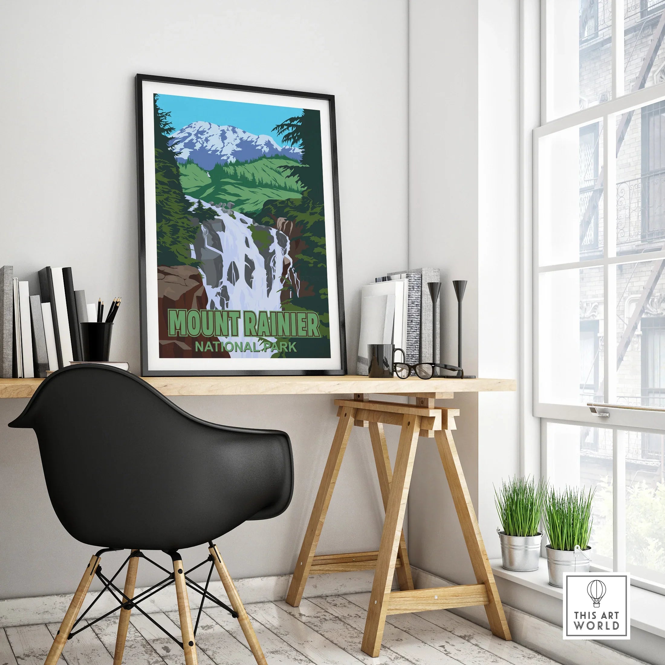 Framed Mount Rainier National Park travel poster on modern office desk, minimalist decor