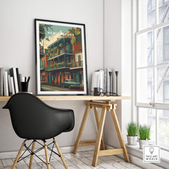 New Orleans Wall Art Print | French Quarter Balcony Travel Poster displayed in a modern workspace with plants.