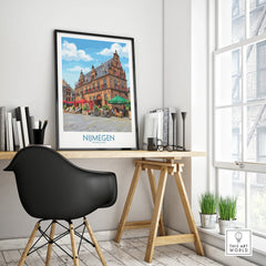Nijmegen cityscape framed travel poster on modern office desk with black chair
