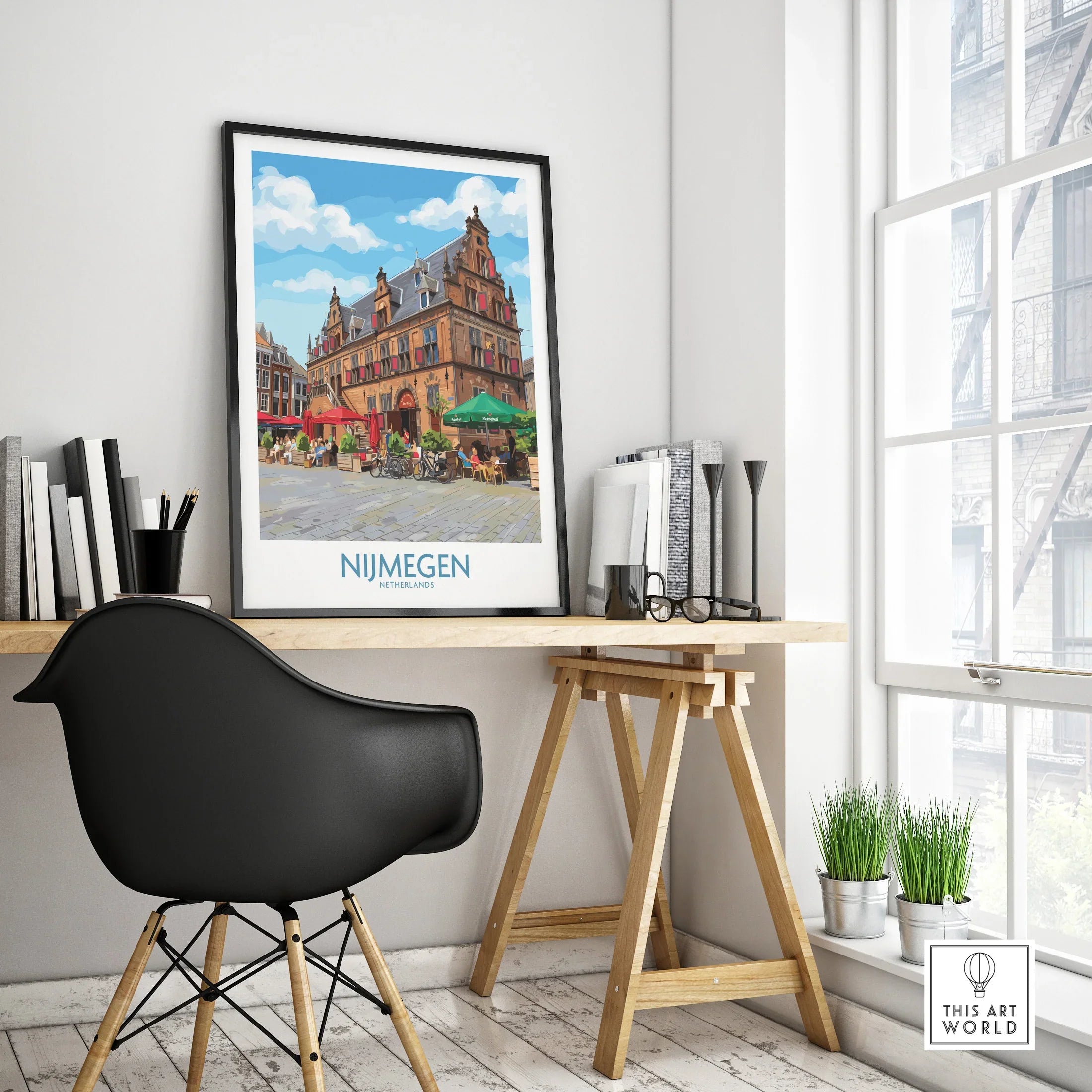 Nijmegen cityscape framed travel poster on modern office desk with black chair