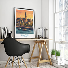 Framed Nijmegen skyline travel poster on modern office desk with black chair