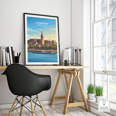 Framed Nijmegen city travel poster on modern office desk with black chair and decor