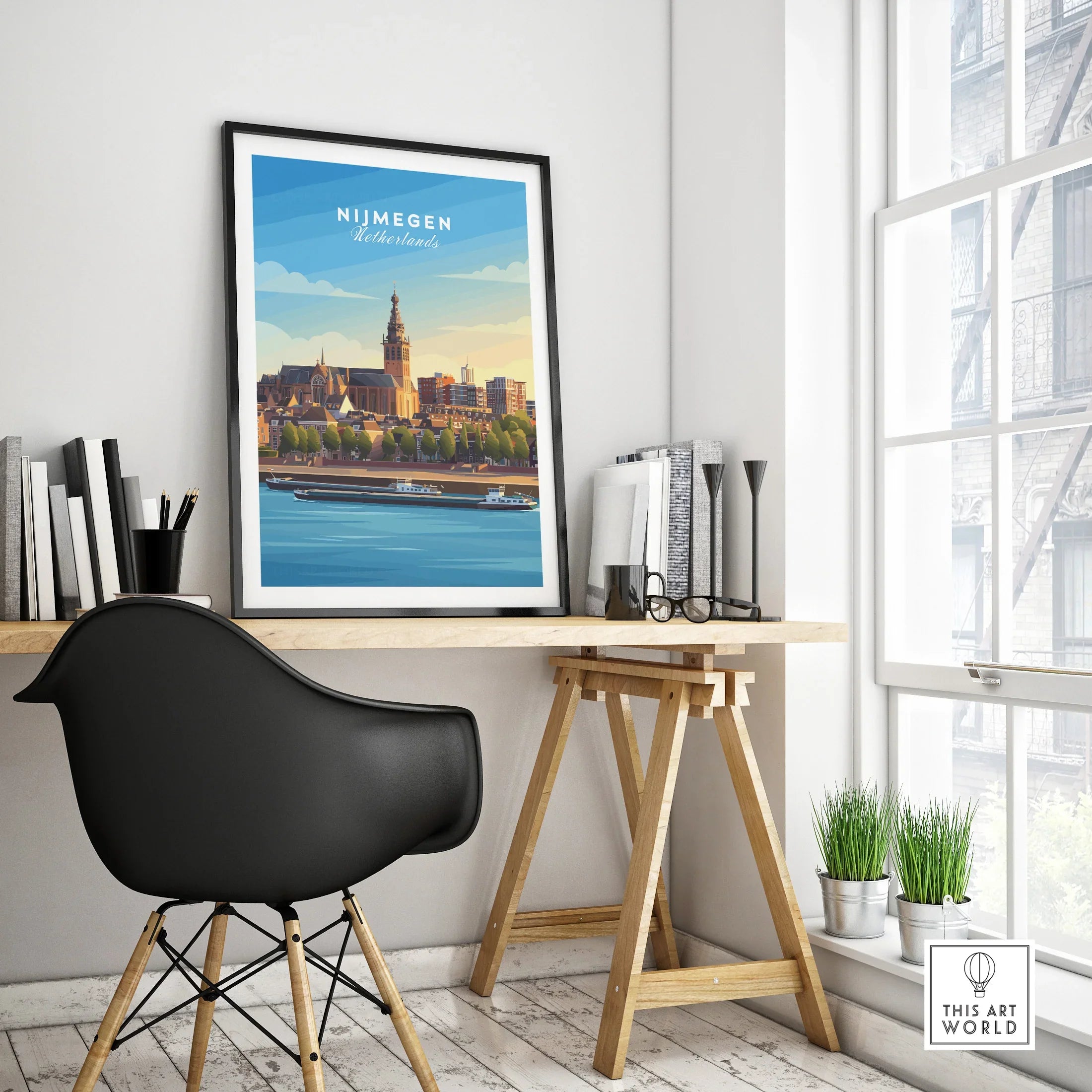 Framed Nijmegen city travel poster on modern office desk with black chair and decor