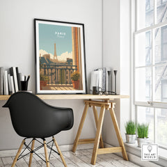 Modern office desk with framed Paris travel poster, Eiffel Tower skyline wall art, black chair