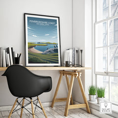 Pembrokeshire Coast National Park travel poster in black frame on modern office desk