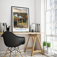 Richmond Hill London travel poster in black frame on modern office desk by window