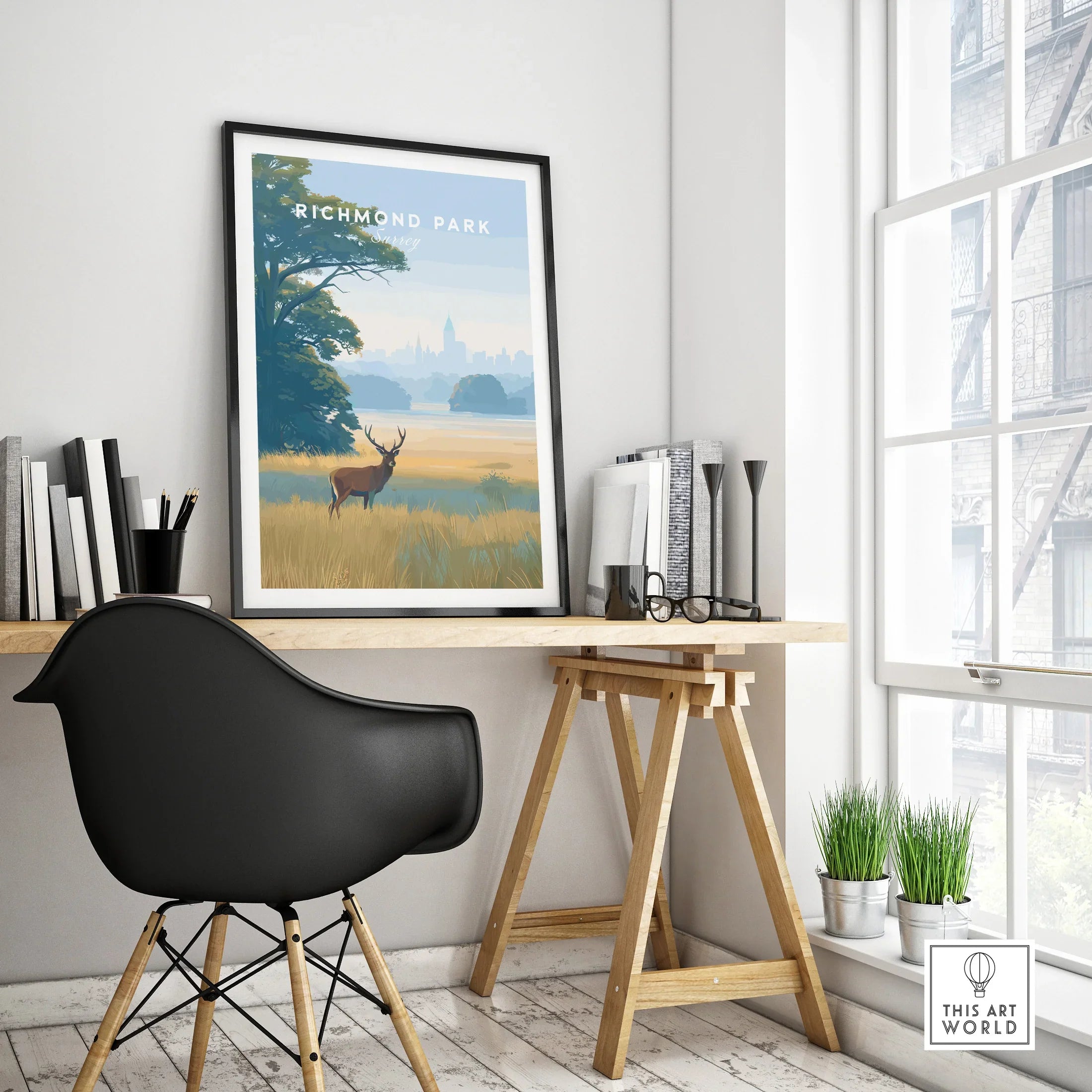 Richmond Park travel poster with deer in black frame on modern office desk, city wall art decor