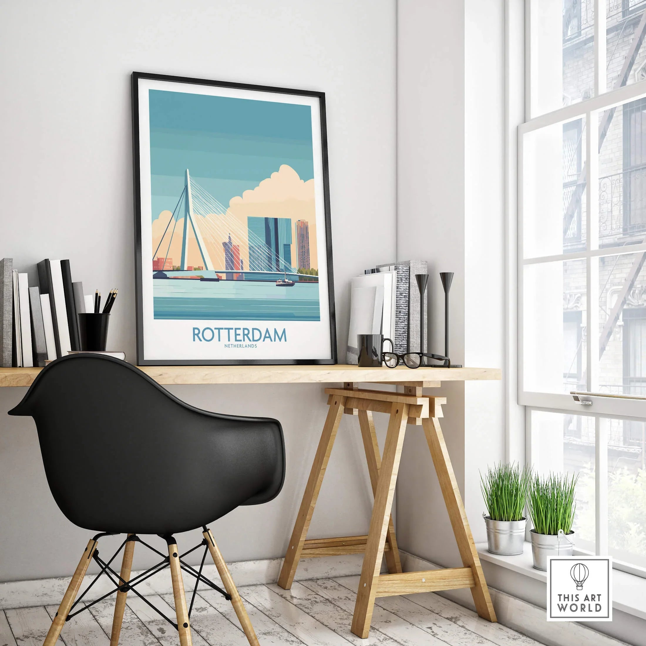 Framed Rotterdam city skyline art print on modern office desk with black chair
