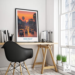 Siem Reap Poster | Bustling Tuk Tuk Cambodia Cityscape Canvas Print displayed in a modern workspace with vibrant colors.