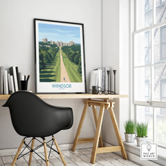 Framed Windsor travel poster with castle, displayed on modern office desk by window