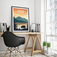 Yoho National Park poster with bear and mountain landscape in black frame on modern office desk