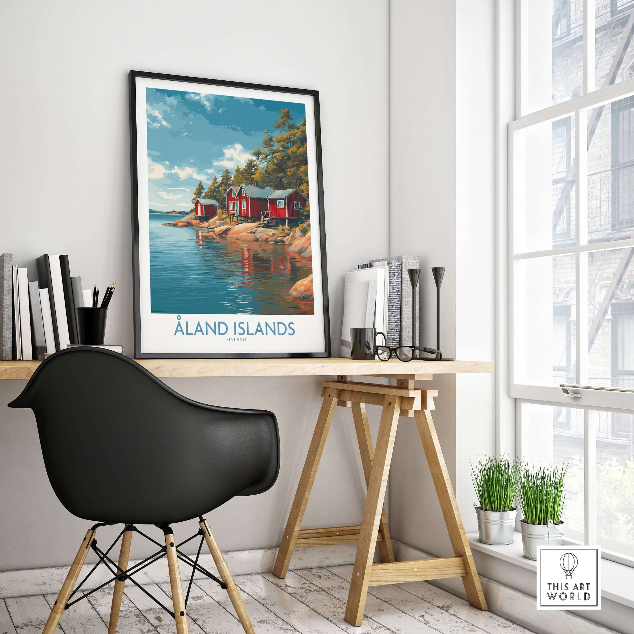 Åland Islands Lakeside Cabin Art Print | Finland Rustic Landscape Poster displayed in a cozy workspace.