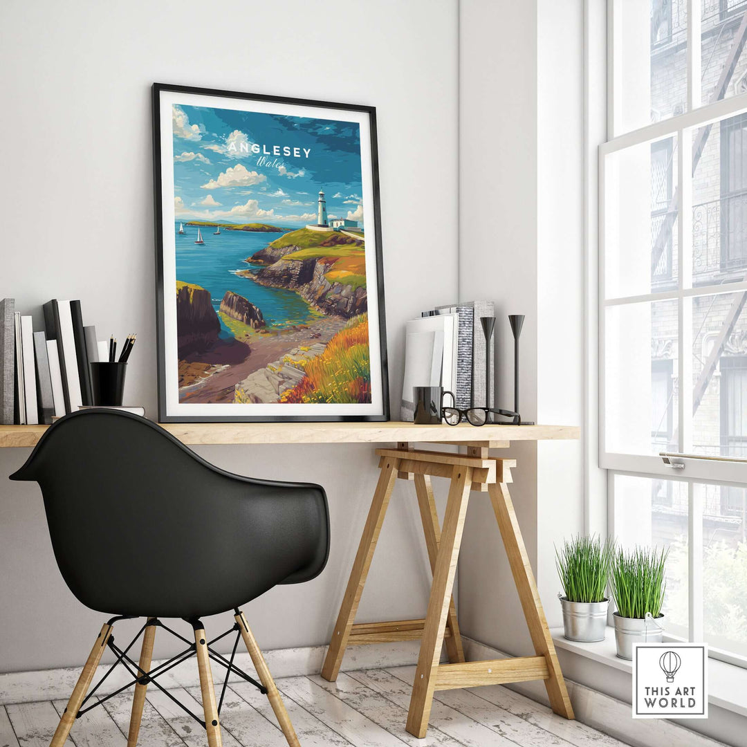 Anglesey Wales sailboats and lighthouse print displayed in a modern workspace, perfect nautical coastal wall art.