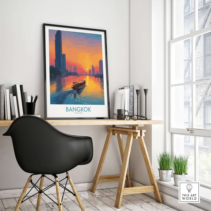 Framed wall art of Bangkok at golden hour featuring a Thai river scene, adding warmth to a stylish interior space.