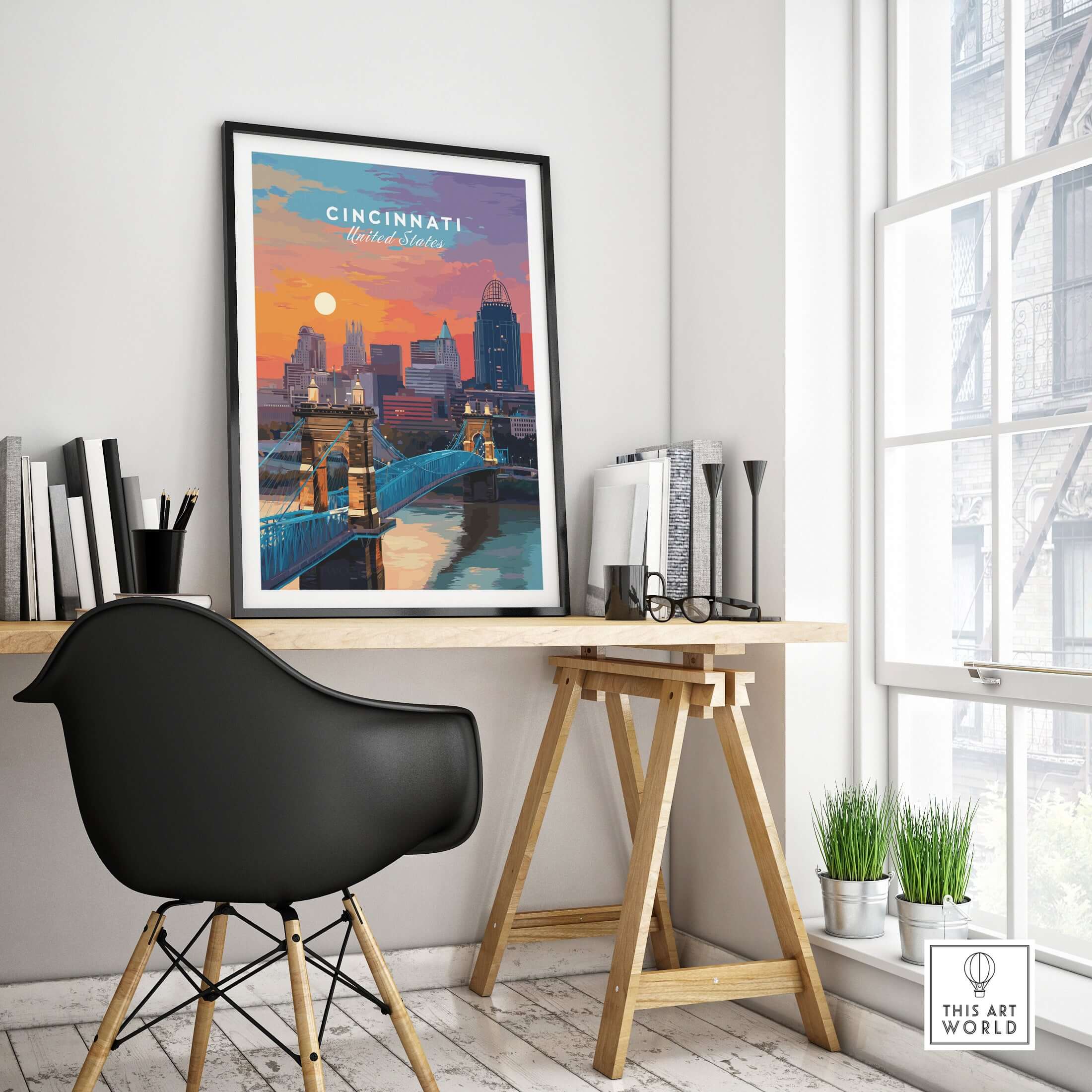 Cincinnati Ohio Sunset Skyline Poster - Roebling Bridge Wall Art displayed in a modern home office with a stylish chair.