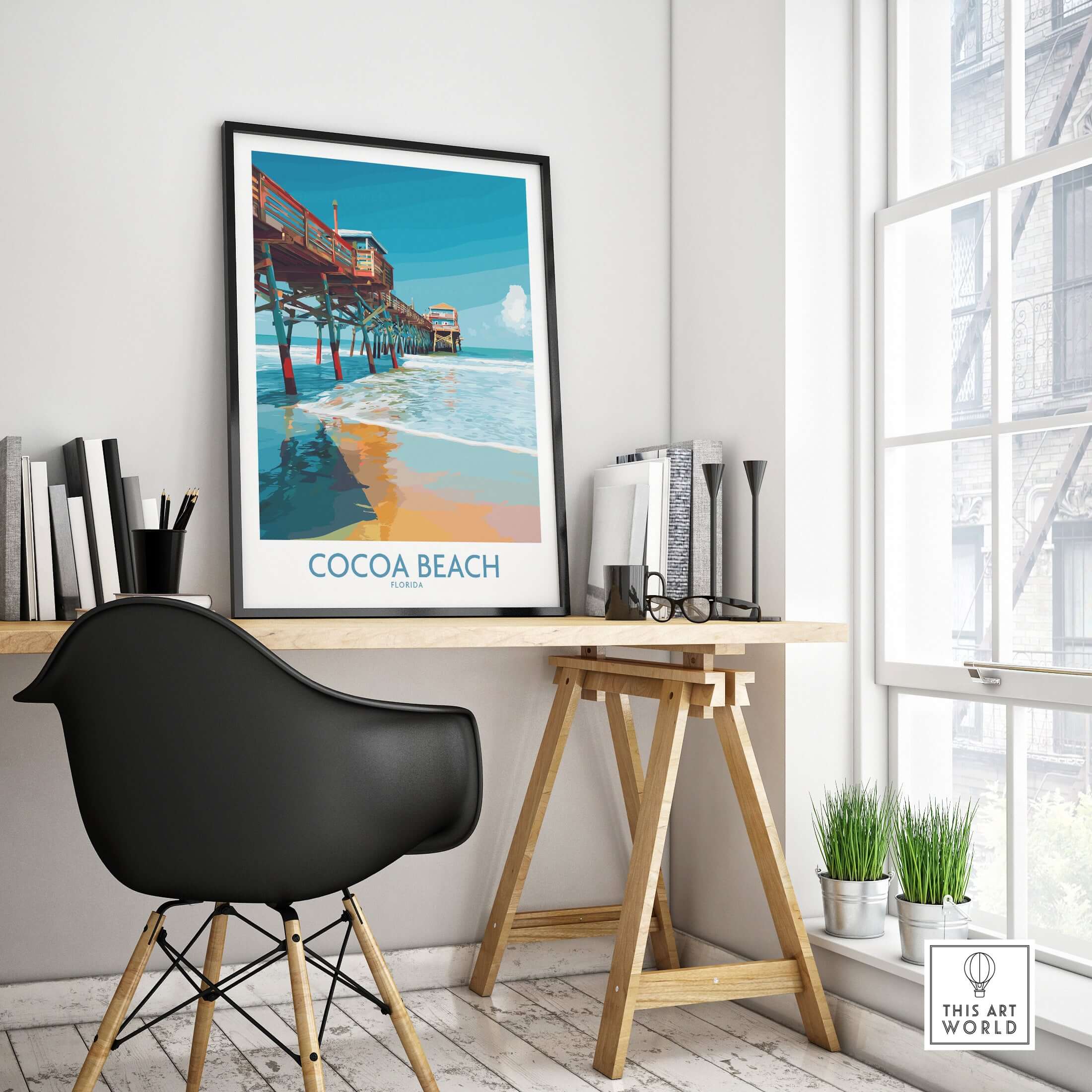 Cocoa Beach Pier Poster - Florida Beach Travel Decor showcased in a modern workspace with black chair and plants.