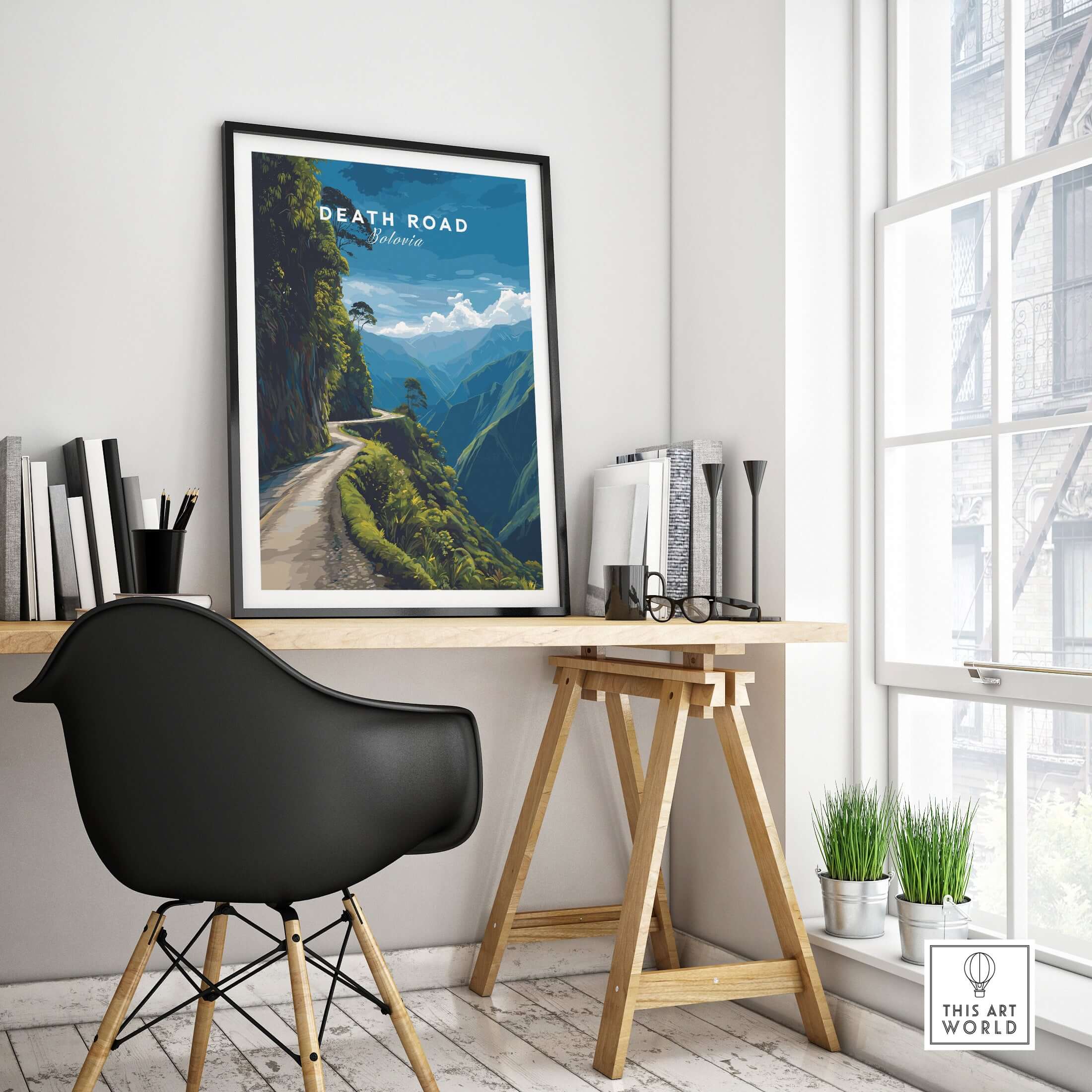 Death Road Print | South America Adventure Decor | Yungas Road Poster displayed in a modern workspace with a desk and chair.